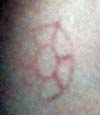 Close-up of "CW's" cross-hair marking